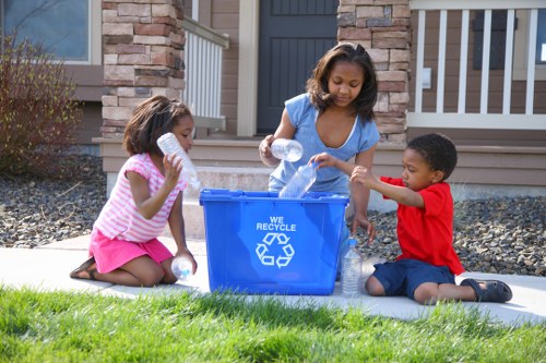 Volunteers sorting donations for reuse in a community partnership program